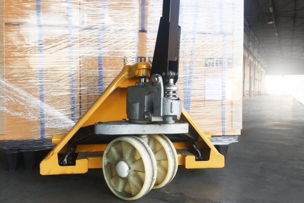 a warehouse trolley pushing the delivered parcel from China to Malaysia